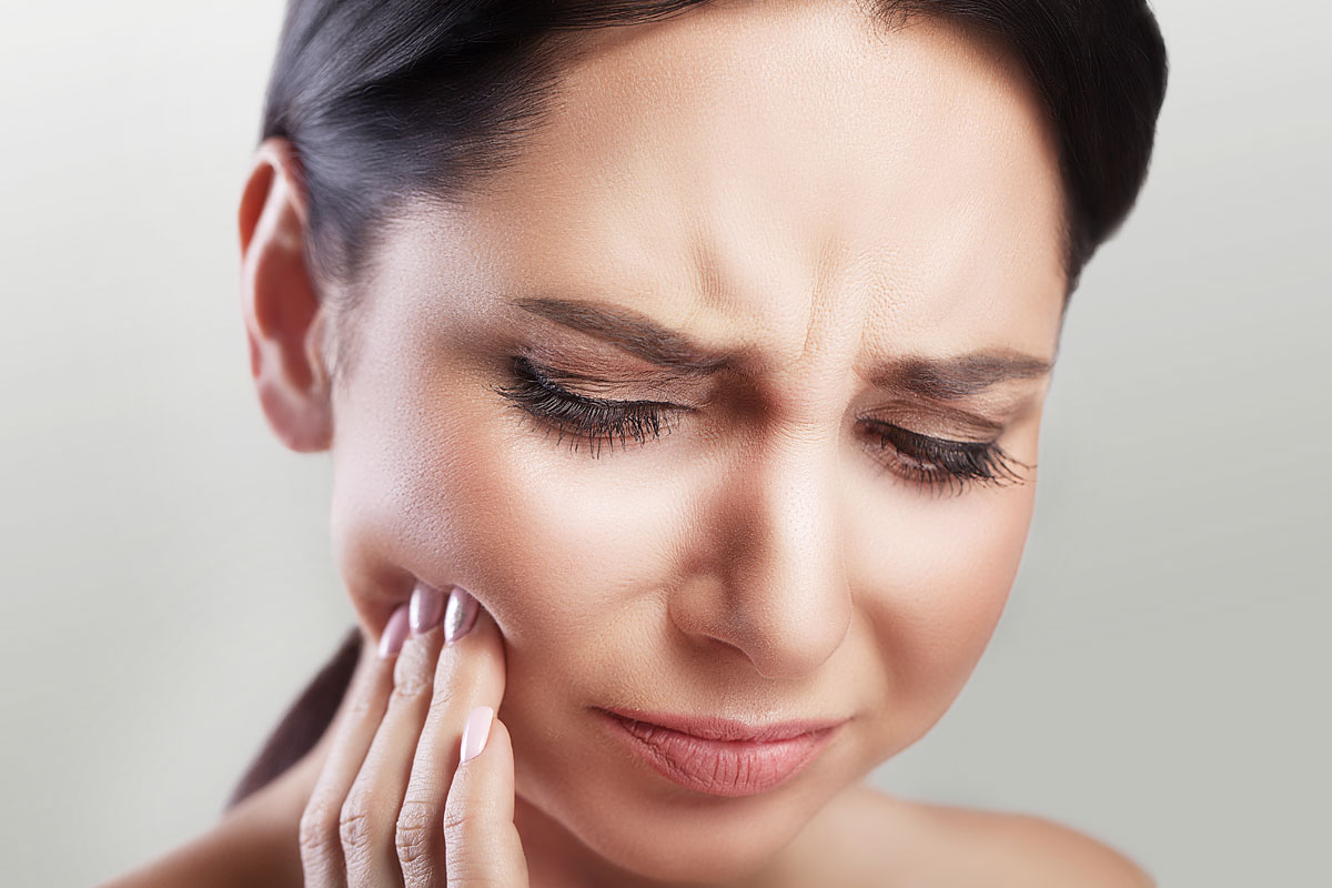 femeie care acuza durere de masea