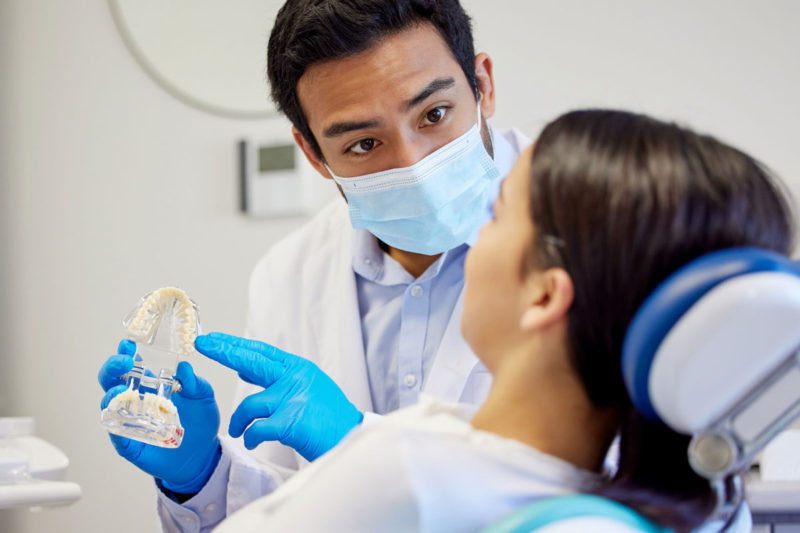un zambet complet cu ajutorul puntii dentare